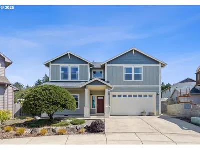 Home at 7115 NE Benton Pl, Newport, OR 97365