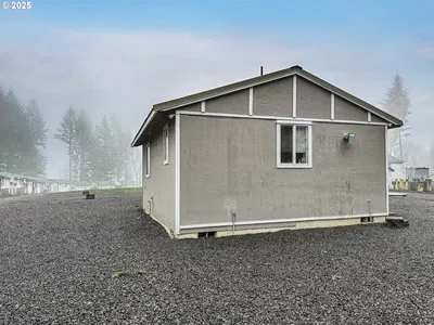 Home at 21200 NW Pumpkin Rid, North Plains, OR 97133