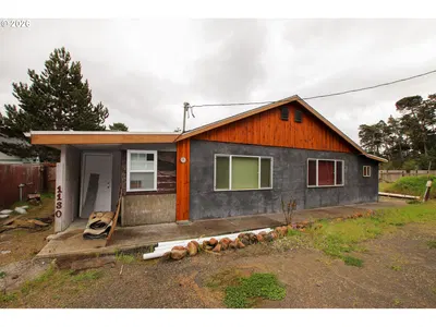 Home at 1120 Rhododendron Dr, Florence, OR 97439 (Pending)